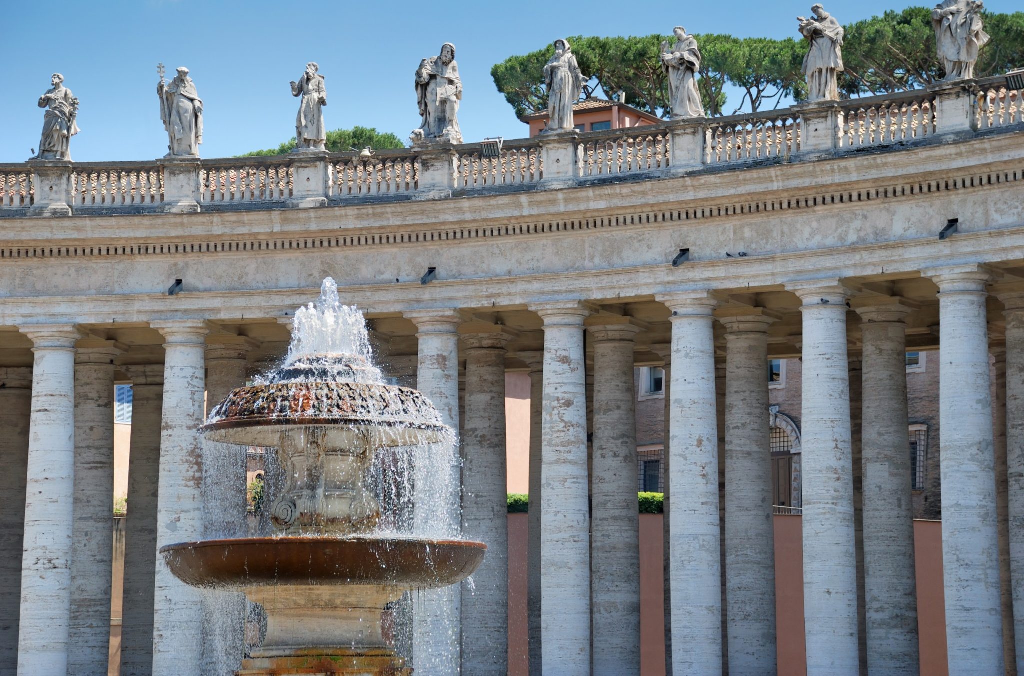 Fountain-and-colonnade-of-St.-Peters-Basilica-in-Vatican-City-1-2048×1353